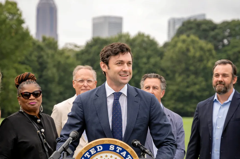 US Democratic senator for Georgia, Jon Ossoff (centre) at a press conference.