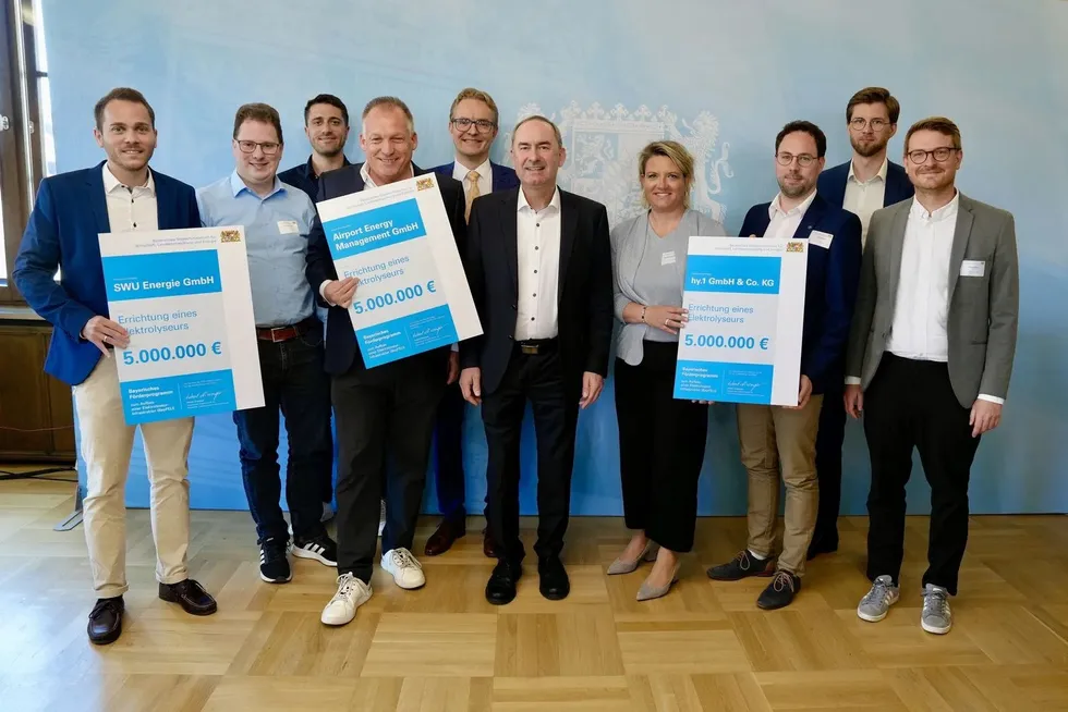 Bavarian minister of economic affairs, Hubert Aiwanger, centre, with representatives from three of the nine winning companies.