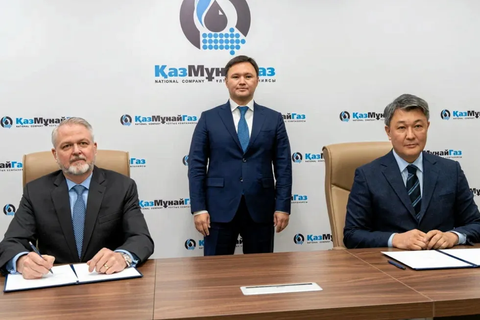 Tengizchevroil general director Kevin Lyon (left), KazMunayGaz executive board chairman Askhat Khasenov (centre) and KazMunayGaz deputy executive chairman Dastan Abdulgafarov.