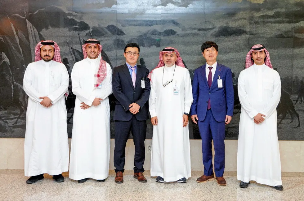 Representatives from the three companies involved in the deal.