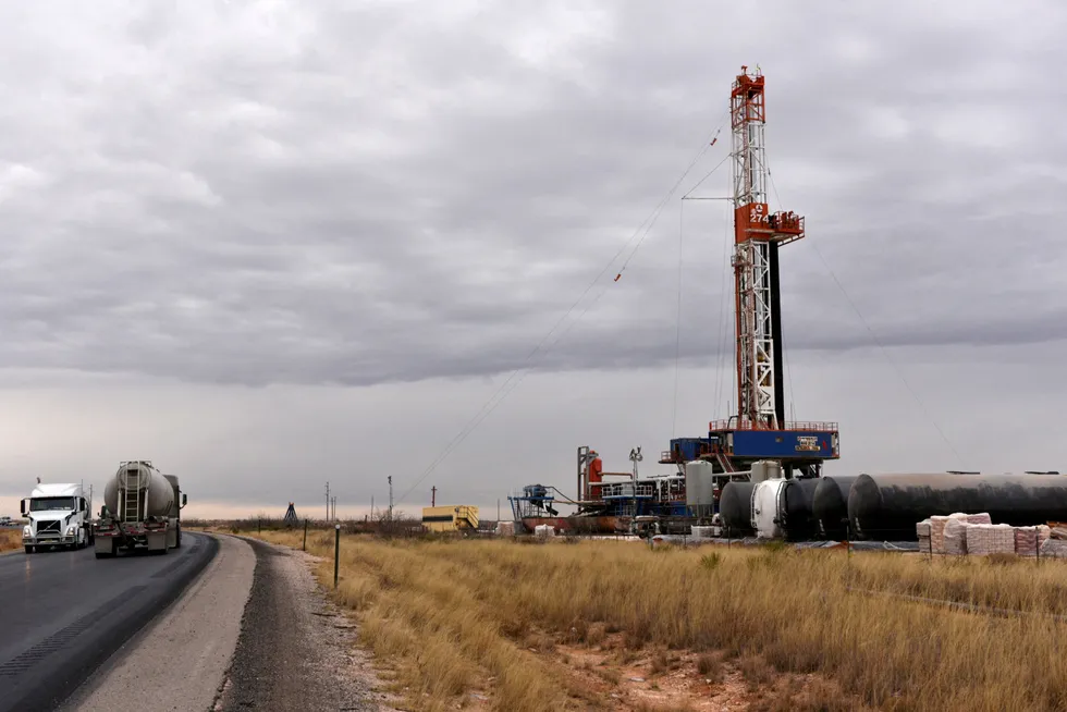 A drilling rig operates in the Permian basin in Lea County, New Mexico, USA, on 10 February 2019.