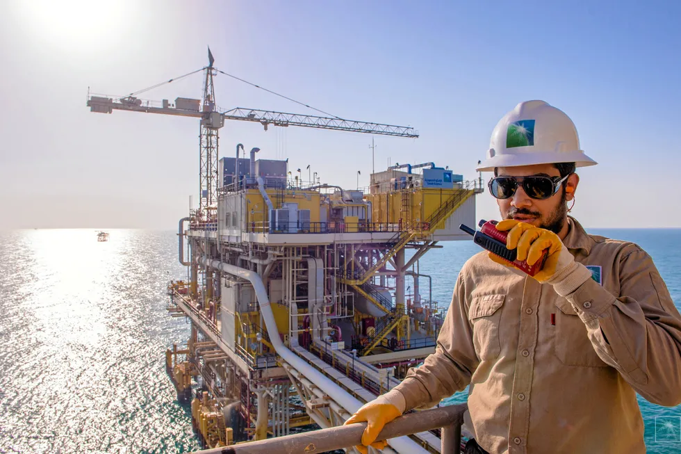 A worker at Aramco's Tanajib oil complex.