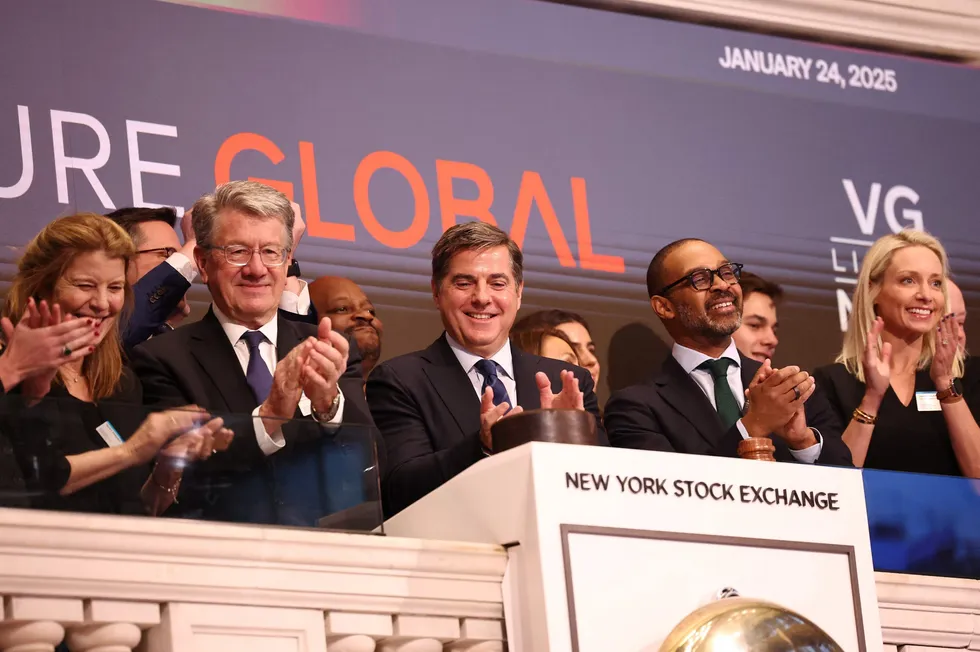 Venture Global co-founder Bob Pender, (left) and co-founder and chief executive Mike Sabel (centre) celebrate after ringing the opening bell at the New York Stock Exchange during morning trading on 24 January 24.