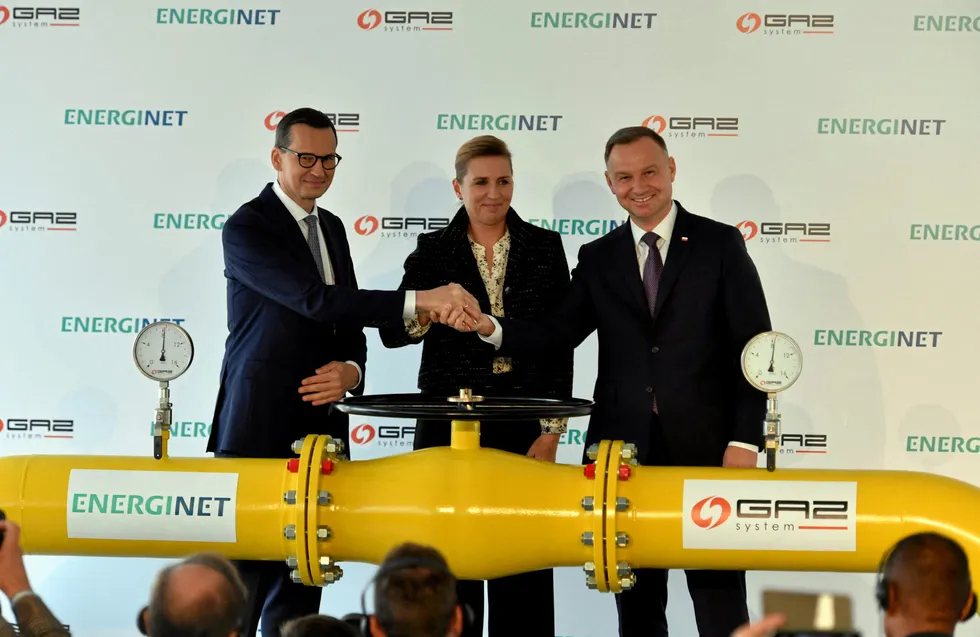 V-Day: Poland’s Prime Minister Mateusz Morawiecki (left), Denmark’s Prime Minister Mette Frederiksen (centre) and Poland’s President Andrzej Duda (right) shake hands during the opening ceremony of the Baltic Pipe gas pipeline in Goleniow in Poland on 27 September 2022