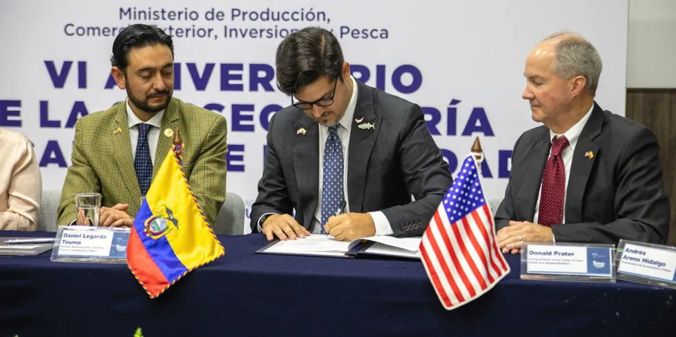 Ecuador Production Minister Daniel Legrada, left, Ecuador Deputy Minister of Fisheries and Aquaculture Andres Arens Hidalgo, center, and Donald Prater, associate commissioner for imported food safety at U.S. Food and Drug Administration signed a deal to improve food safety of imported shrimp.