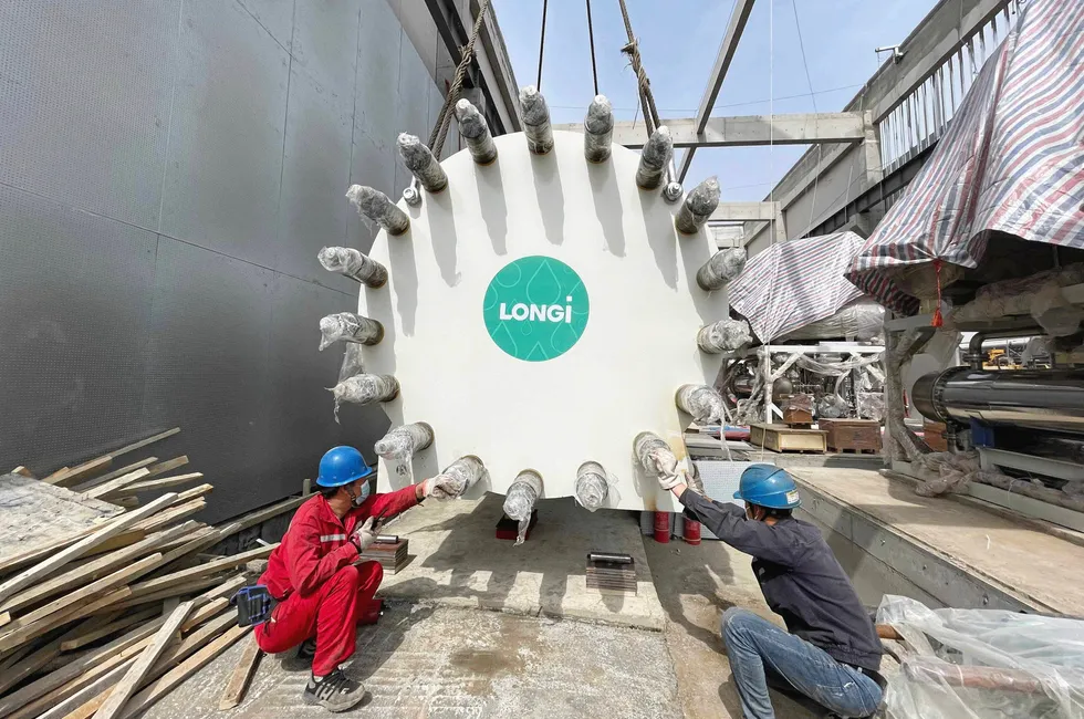 A Longi electrolyser stack being lowered into position at the Qinghai Asia Silicon project in China.