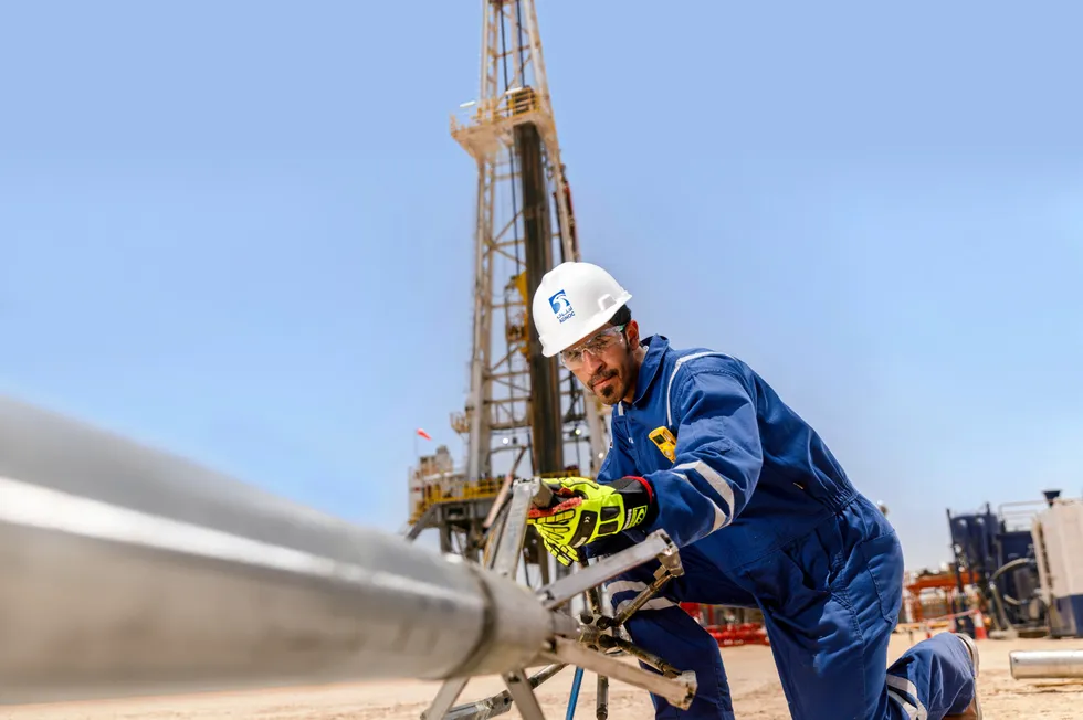 An Adnoc worker at a wireline truck in Abu Dhabi.