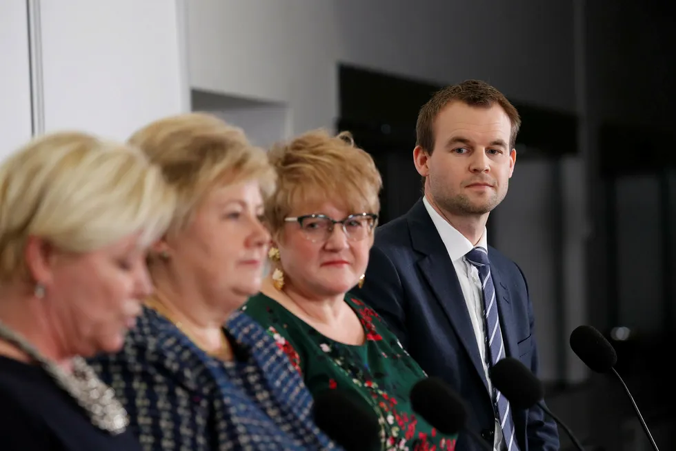 New partners: Party leaders Siv Jensen of the Progress Party (left), Prime Minister Erna Solberg of the Conservatives and Trine Skei Grande of the Liberals with Christian Democrats deputy leader Kjell Ingolf Ropstad (right) in Oslo Thursday.