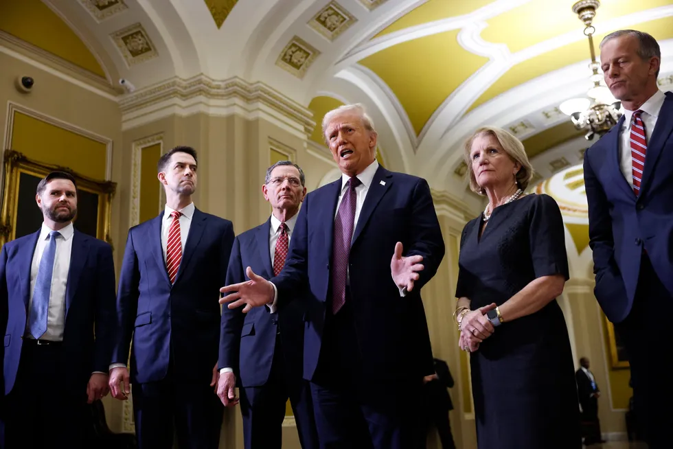 Senator Shelley Moore Capito standing next to President Donald Trump and Republican colleagues including Vice-President JD Vance (far left).