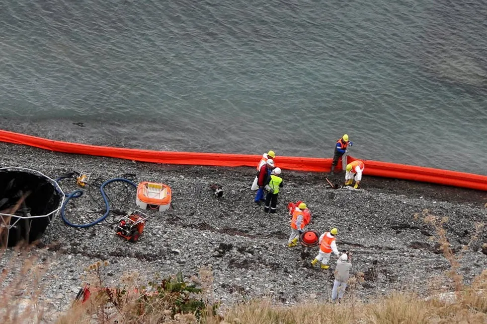 Quick response: A Caspian Pipeline Consortium oil spill response team during a recent drill near the offshore loading terminal on the Black Sea in Russia