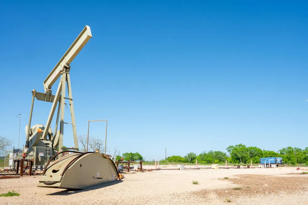 A component from an oil pumpjack lays on the ground in Runge, Texas.