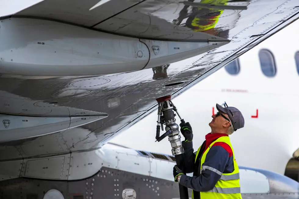 An airplane being refuelled at Vilnius Airport.