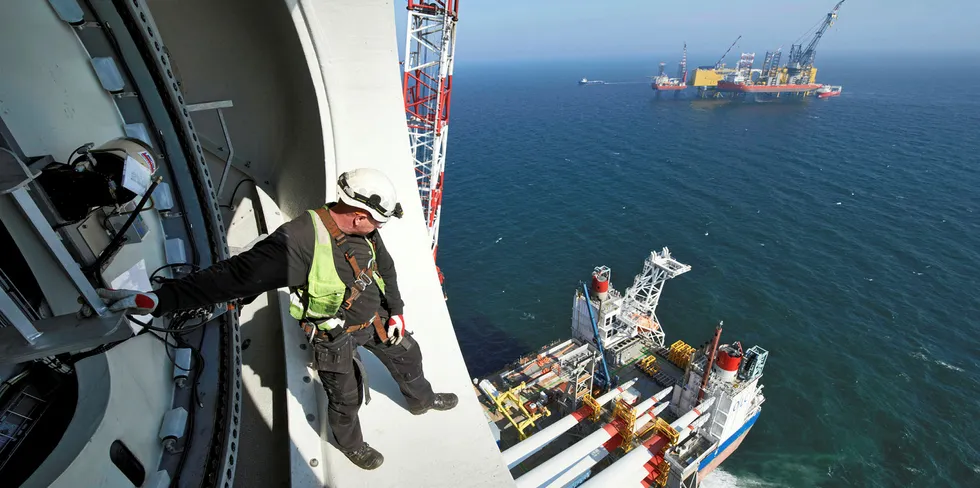 A worker at the construction of the Nordsee Ost offshore wind farm.