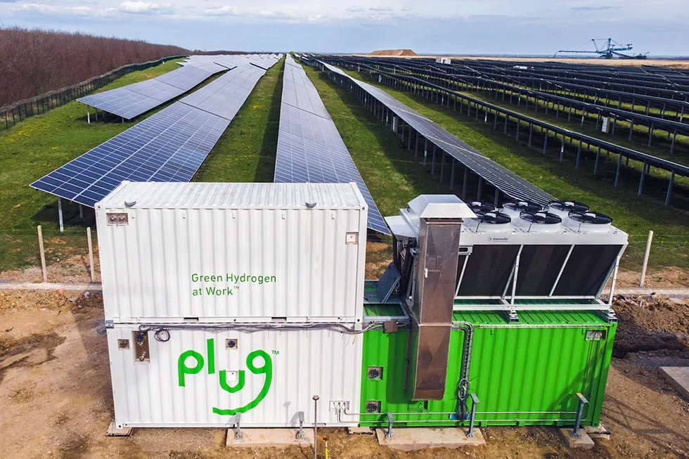 A Plug electrolysis system installed next to a solar farm.