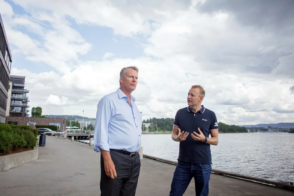 Ferd-eier Johan H. Andresen sammen med avtroppende Swix-sjef Tomas Holmestad (t.h.).