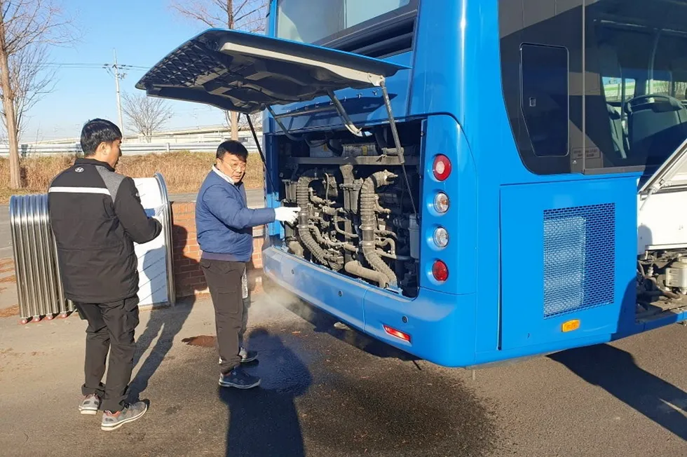 Hyundai employees inspecting one of the 178 hydrogen buses operating in Jeonju city.