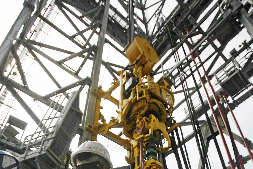 Rig-building: a worker stands at Singapore’s Keppel Fels in 2007.