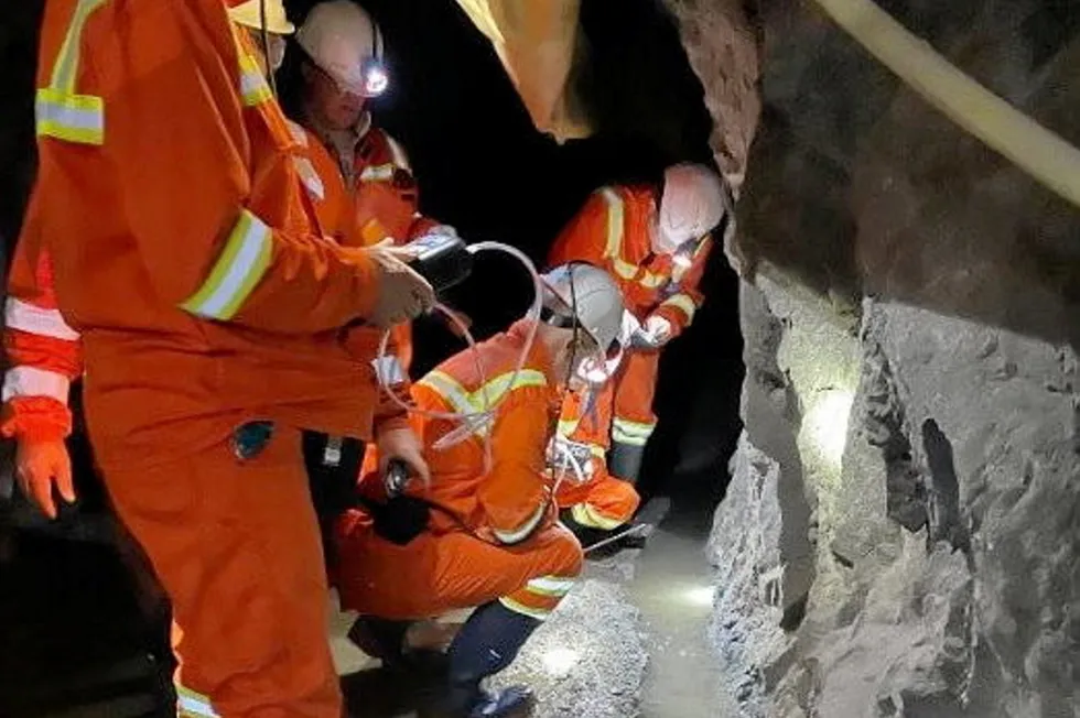 Researchers taking gas measurements at the bubbling pool almost 1km underground where 84% hydrogen was discovered.