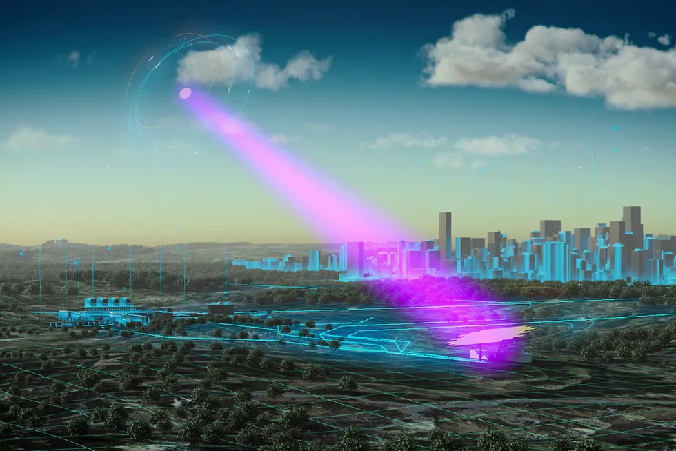 An ESA visualisation of a satellite beaming down solar power to a receiver station on Earth.