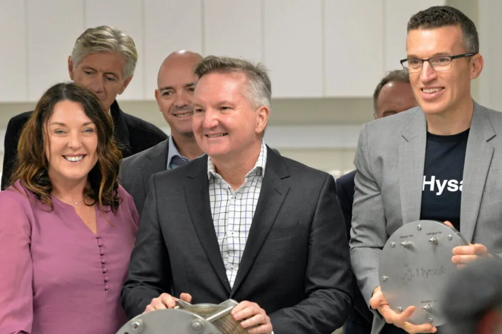 Australian energy minister Chris Bowen (middle) and Hysata CEO Paul Barret (right) at opening of Port Kembla manufacturing facility.