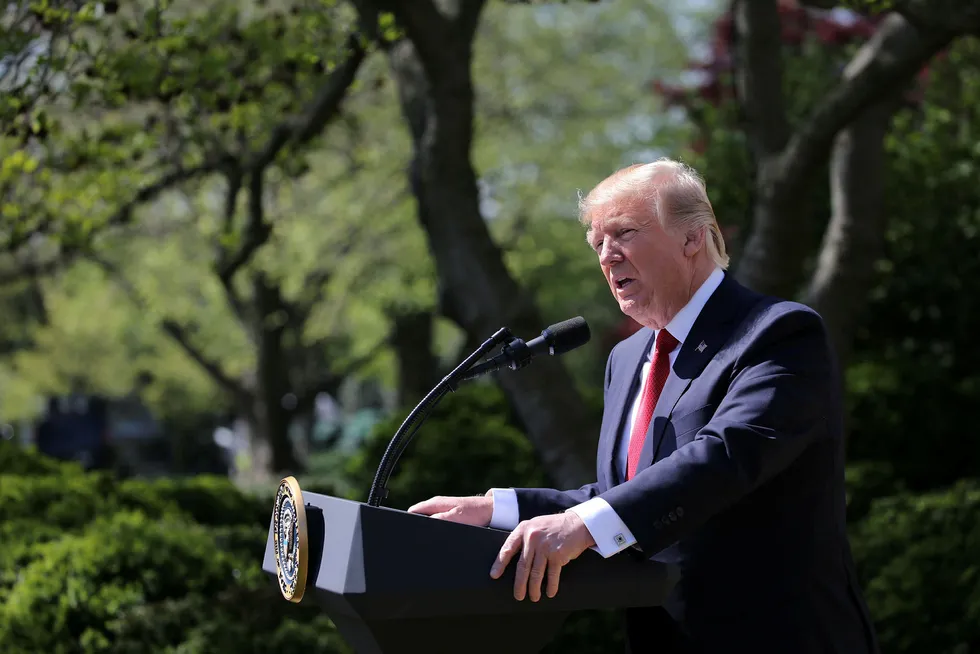 Her i rosehagen i Det hvite hus vil Donald Trump i kveld norsk tid kunngjøre sin avgjørelse om Parisavtalen. Foto: Carlos Barria/Reuters/NTB scanpix