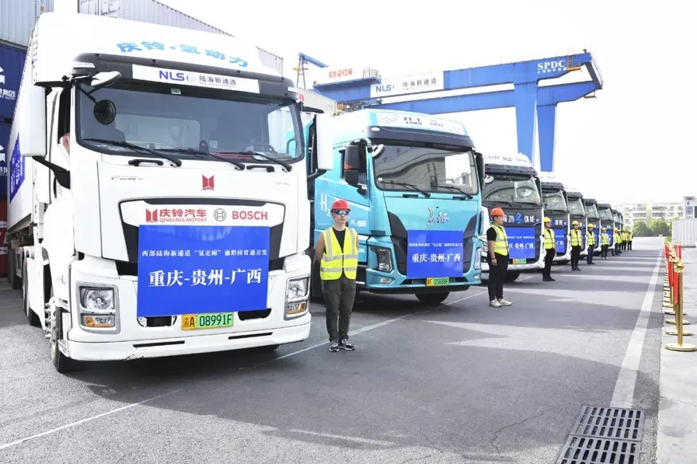 Trucks lined up during the opening ceremony for the new cross-regional hydrogen trucking corridor
