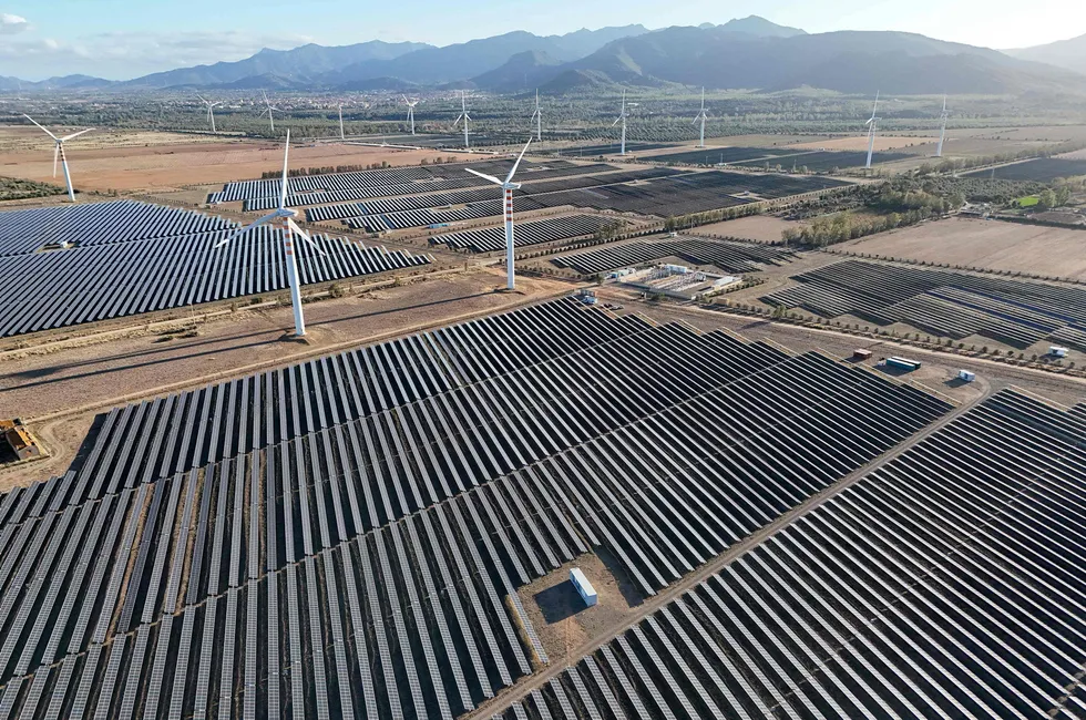 Wind turbines and solar pannels on a site in Sardinia, Italy.