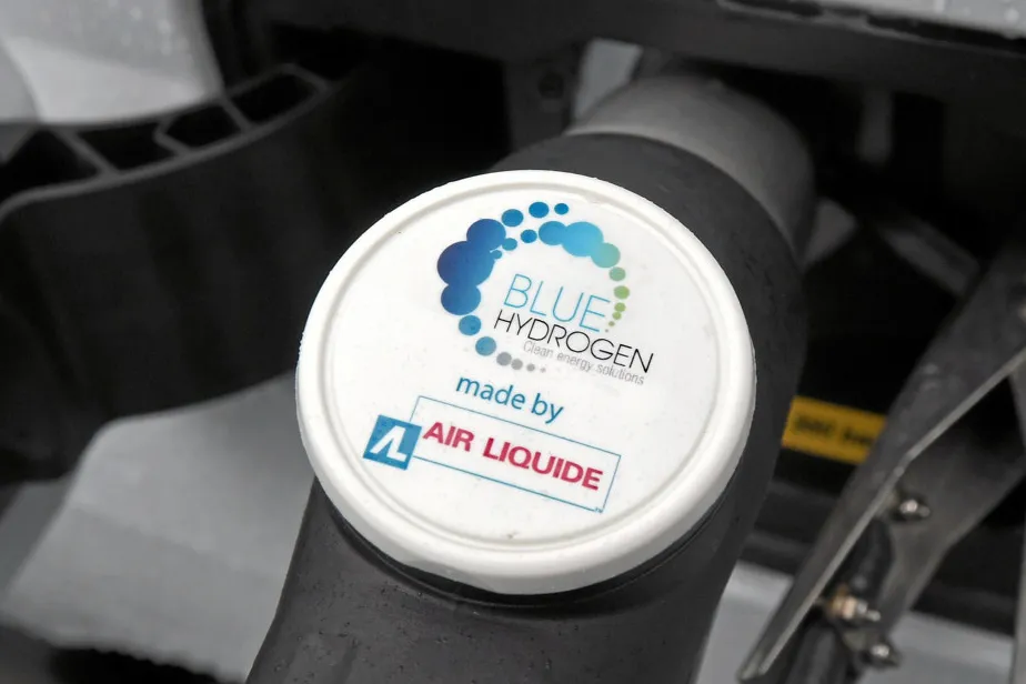 A car being filled up with 'blue hydrogen' at a filling station in France.