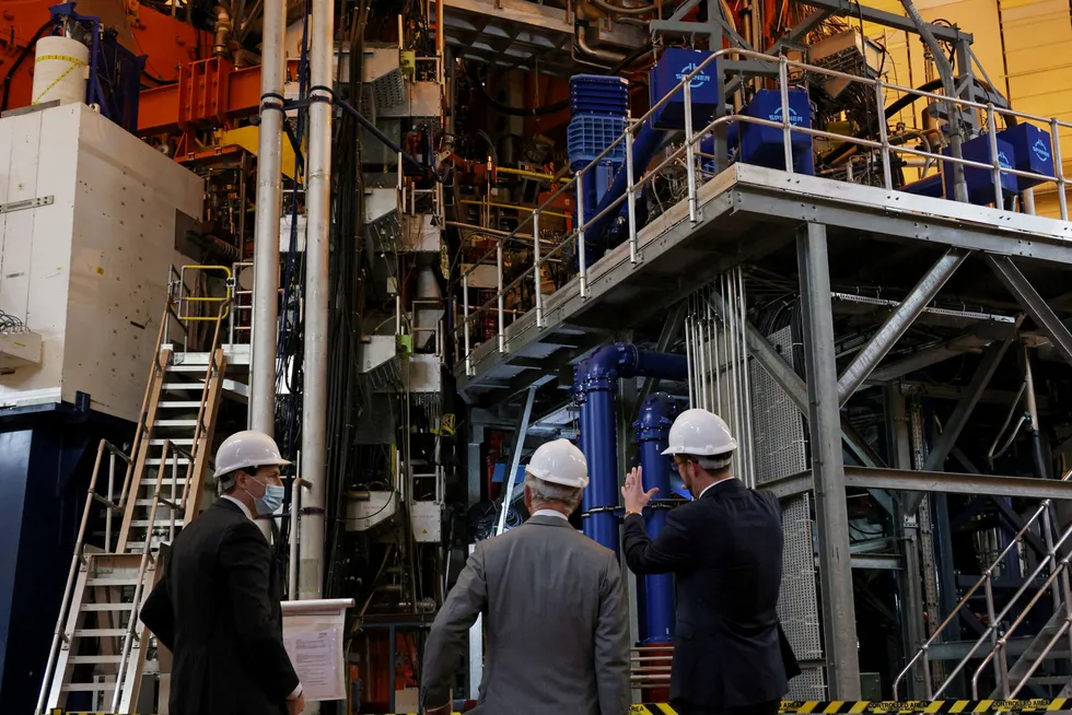 A team of researchers from the Eurofusion consortium produced 59 megajoules from a sustained reaction lasting five seconds – enough power to boil about 60 kettles – in an experiment at the Joint European Torus (JET) facility in Oxford, England. Britain's Prince Charles is shown the JET at the UK Atomic Energy Authority on January 31, 2022.