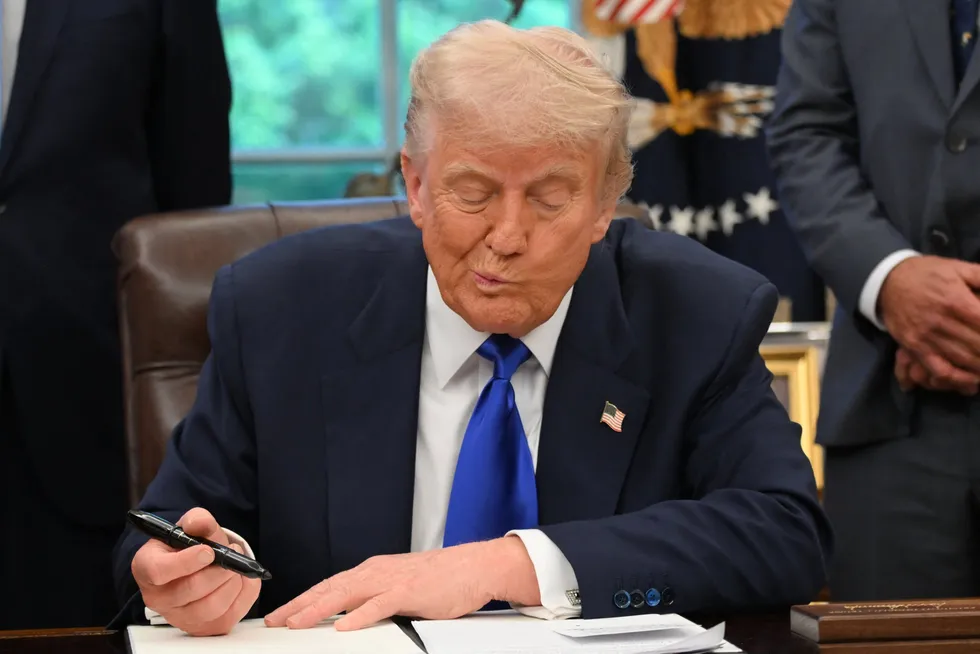 US President Donald Trump signing executive orders in the Oval Office of the White House this week.
