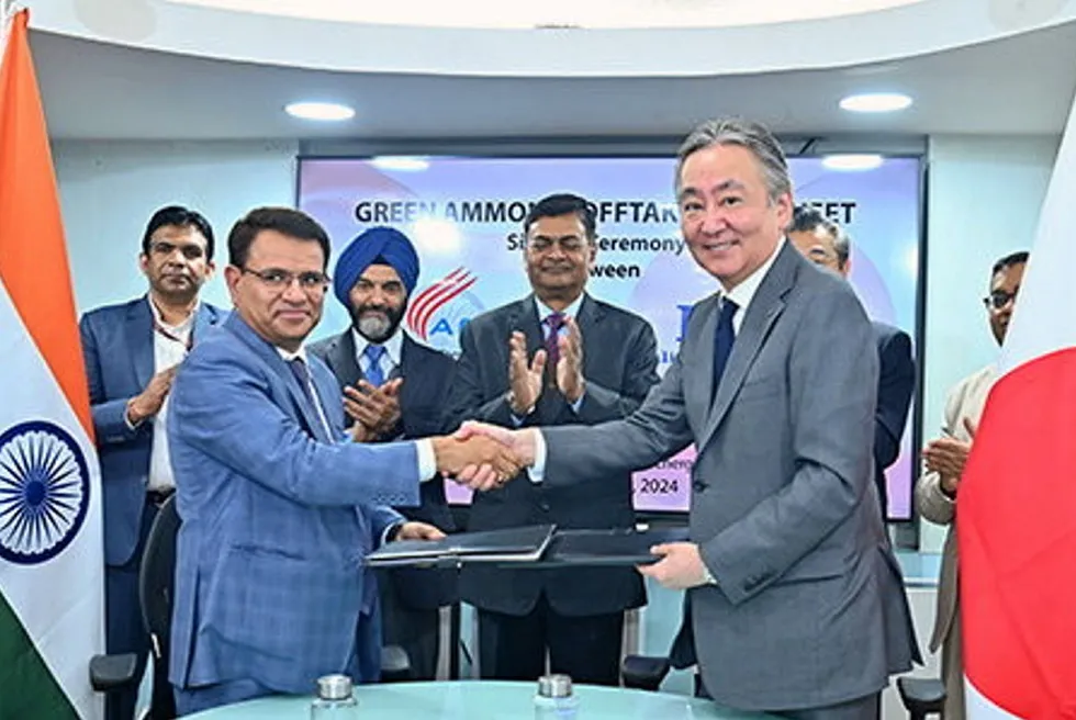 The signing ceremony between ACME and IHI.