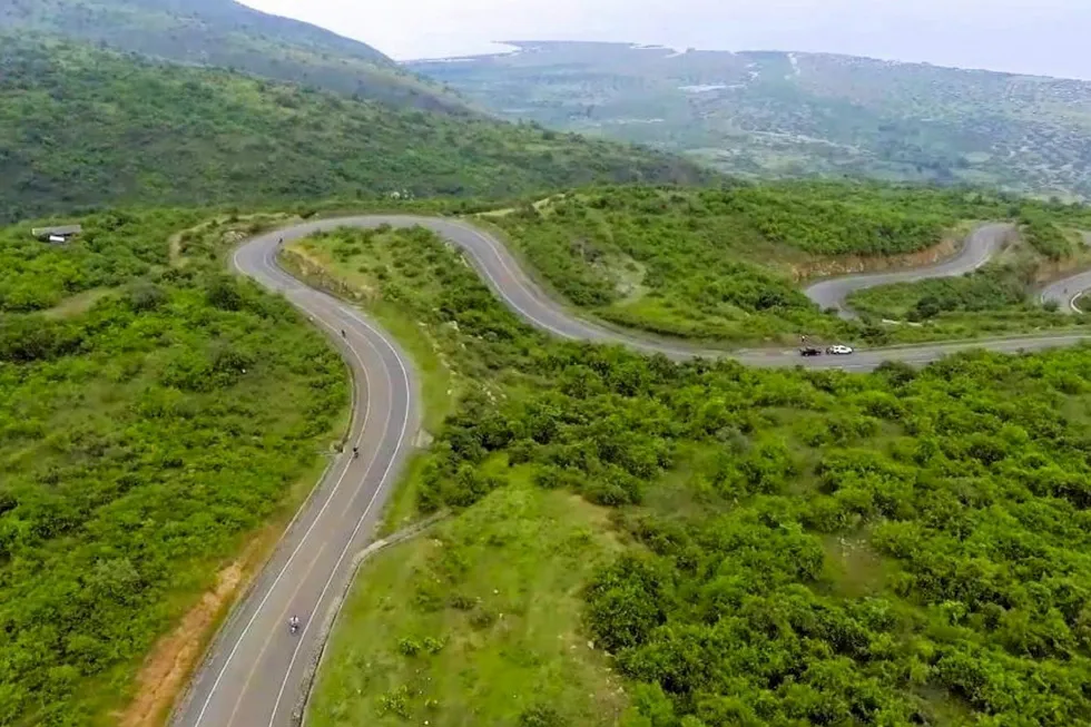 On the move: Uganda's expanded paved road network on the shores of Lake Albert (pictured) will be vital for the transport of drilling equipment and facilities to the Tilenga oilfield construction site