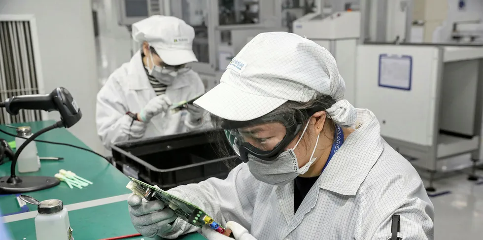 A Chinese employee works at a factory in Nantong in China's eastern Jiangsu province.