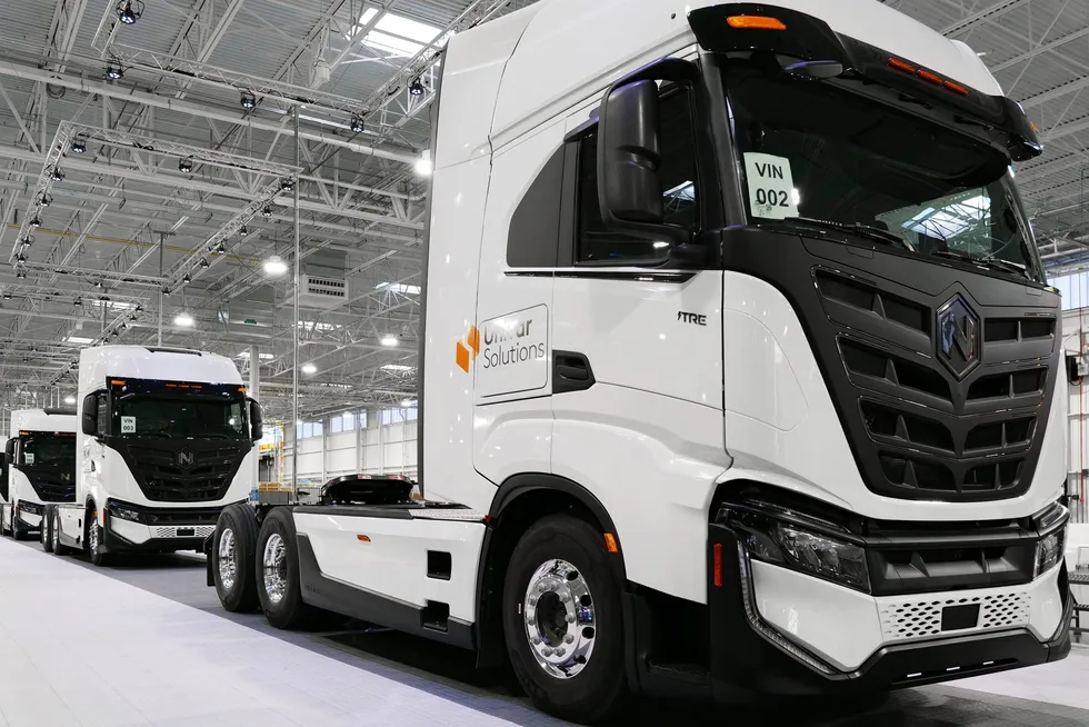 Battery-electric versions of Nikola's Tre trucks at its manufacturing site in Coolidge, Arizona