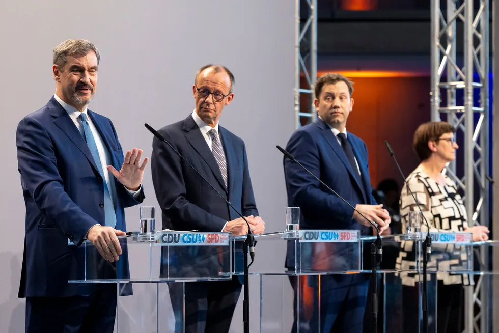 (l-r) Markus Soeder, leader of the Christian Social Union (CSU) speaks as Friedrich Merz, leader of the Christian Democratic Union (CDU), and Lars Klingbeil and Saskia Esken, co-leaders of the German Social Democrats (SPD), speak to the media during the presentation of the coalition contract between the three parties