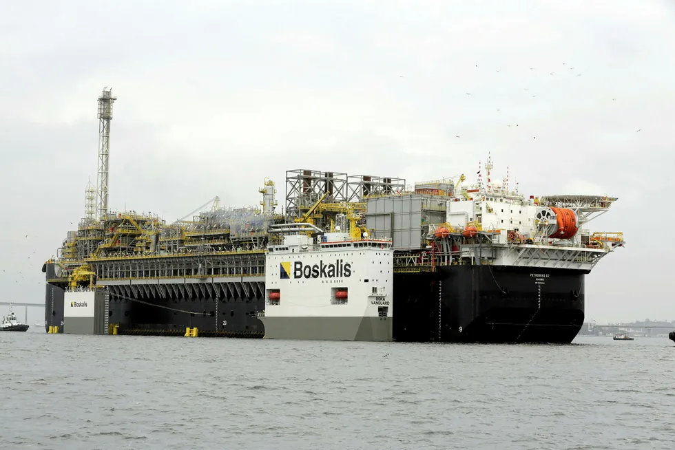 Bound for Lula North: the P-67 FPSO is offloaded from the Boskalis semi-submersible heavy lift vessel Boka Vanguard at Rio Grande port