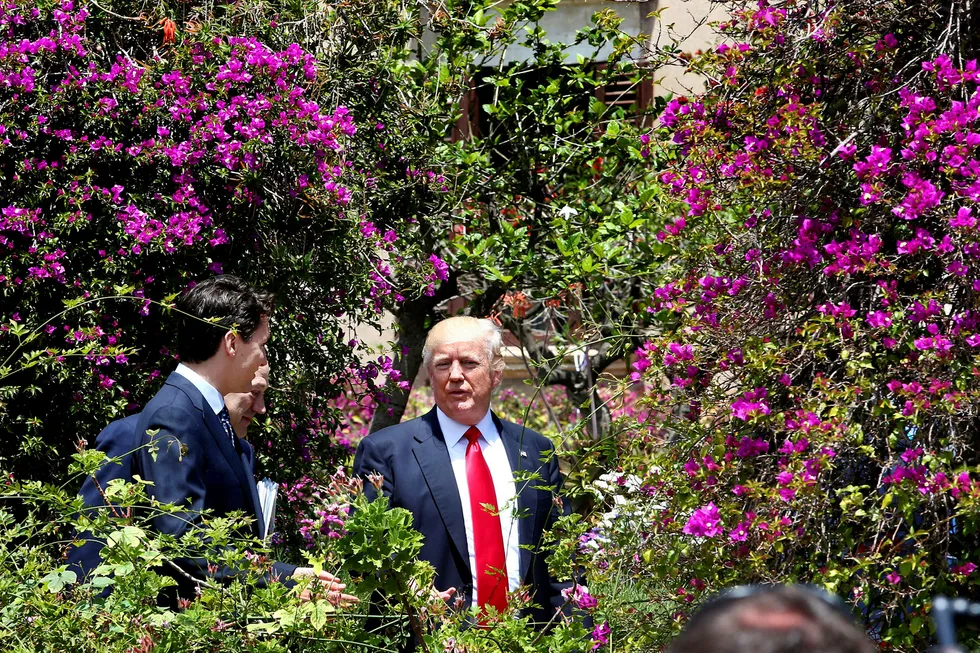 USAs president Donald Trump hadde ikke noe å si til sine kolleger i G7 om Parisavtalen, men lovet i helgen å ta en beslutning i løpet av uken. Her med Canadas statsminister Justin Trudeau. Foto: Alessandro Bianchi/Reuters/NTB Scanpix