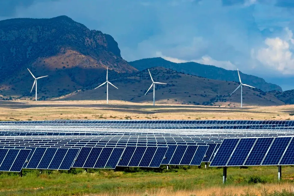 Wind turbines and solar panels in operation