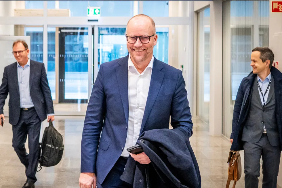 Aker Solutions chief executive Kjetel Digre flanked by chief financial officer Idar Eikrem (left) and head of media Hallvard Norum (right)