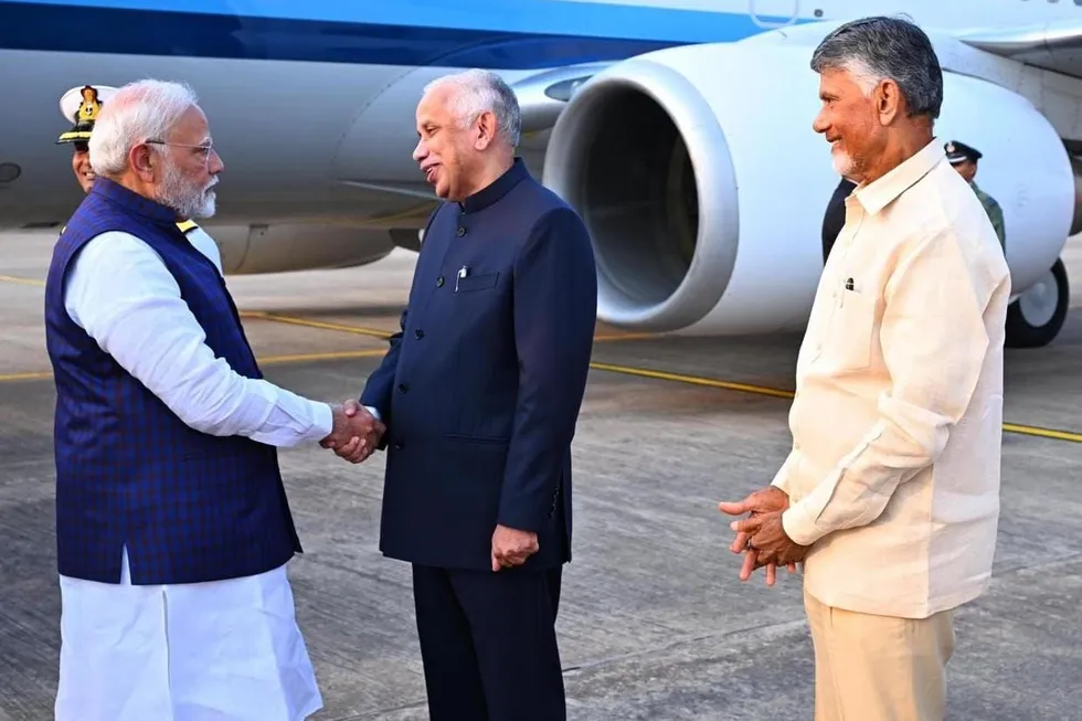 Syed Abdul Nazeer, governor of Andhra Pradesh, and Narendra Modi, India's prime minister, meet at Visakhapatnam in January