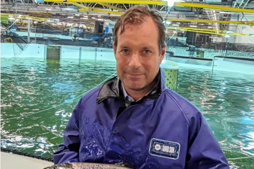 . Joachim Nielsen with one of Proximar's land-farmed Atlantic salmon.