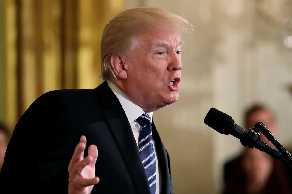 President Donald Trump fotografert i Det hvite hus fredag. Foto: Evan Vucci / AP / NTB Scanpix