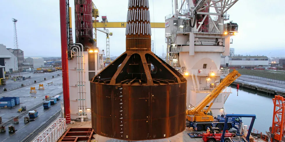 Universal Foundation's Mono Bucket foundation for Dogger Bank Met. Mast - loading onto the deck of jack-up vessel Brave Tern