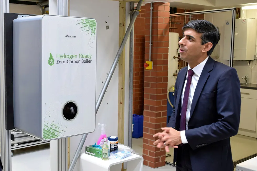UK Prime Minister Rishi Sunak being shown a hydrogen-ready boiler manufactured by Worcester Bosch.
