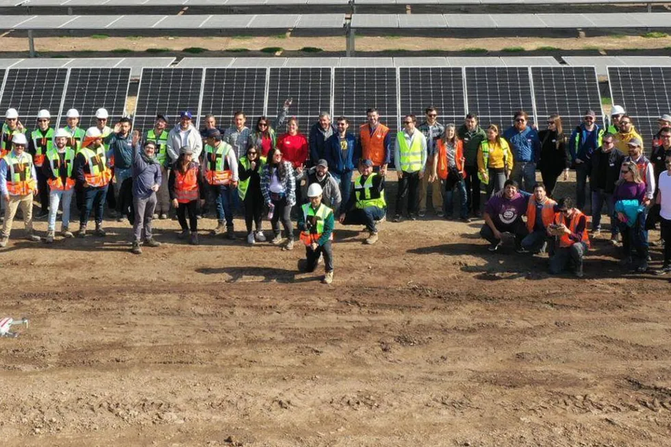 The team at Verano Energy in front of a solar power installation