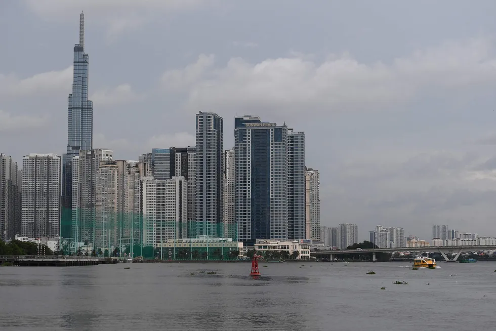 Vietnam utpekes som verdens økonomiske vekstvinner i 2022. Her fra et område ved Saigon River i Ho Chi Minh City.