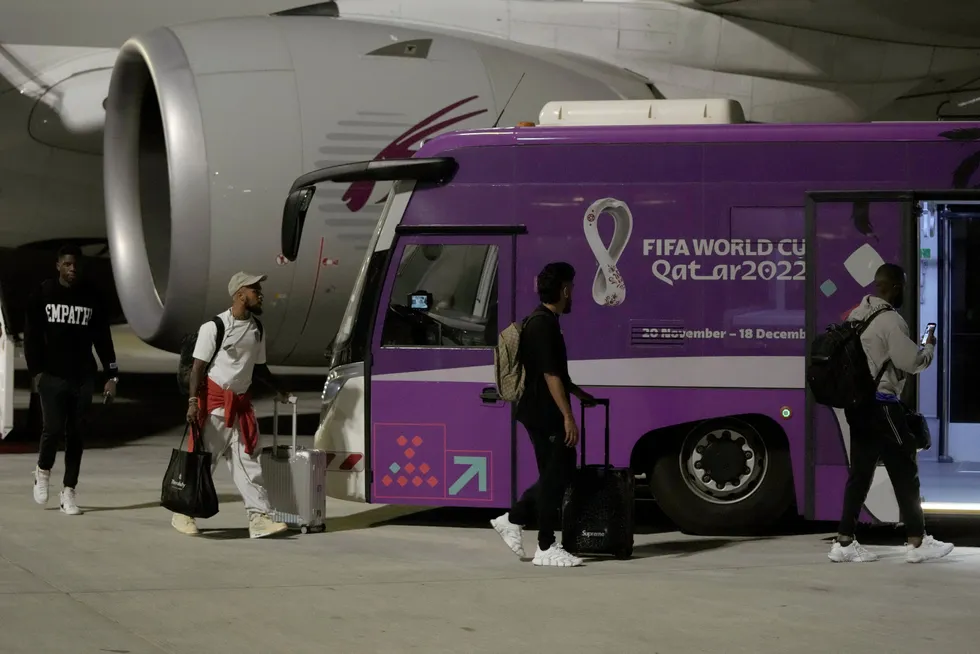 Football first: Members of the US soccer team arrive with at Doha's international airport in Qatar ahead of the upcoming World Cup