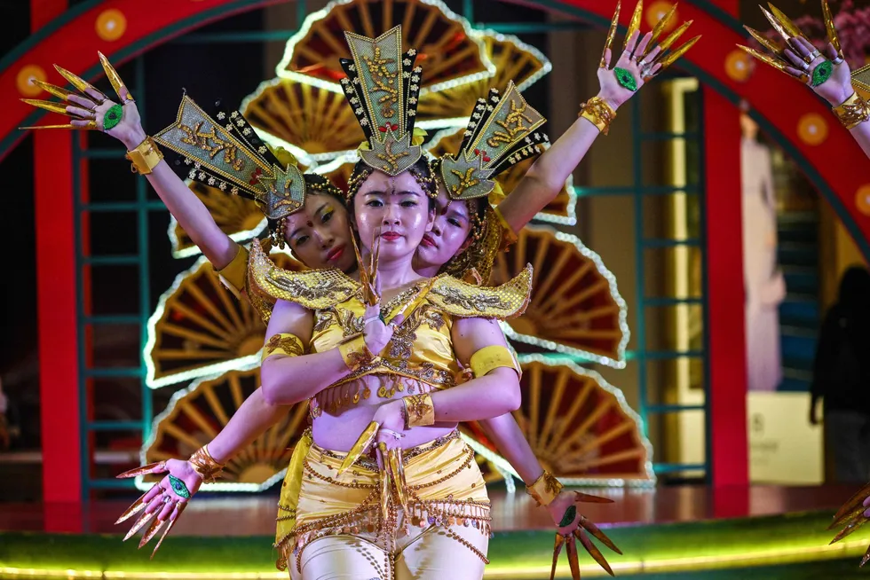 Dancers perform the 'Thousand Hands' dance ahead of the 2025 Lunar New Year celebrations in Indonesia.