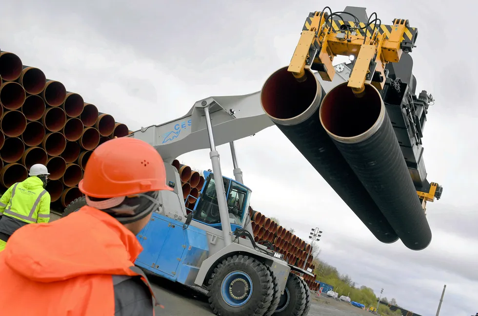 On the move: Specialised coated pipes for Nord Stream 2 project are uploaded in the German port of Mukran on the Baltic Sea