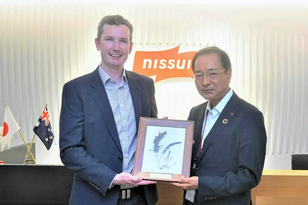 Immersion Group CEO Scott Elliott (right) and Nissui President Hamada (left).